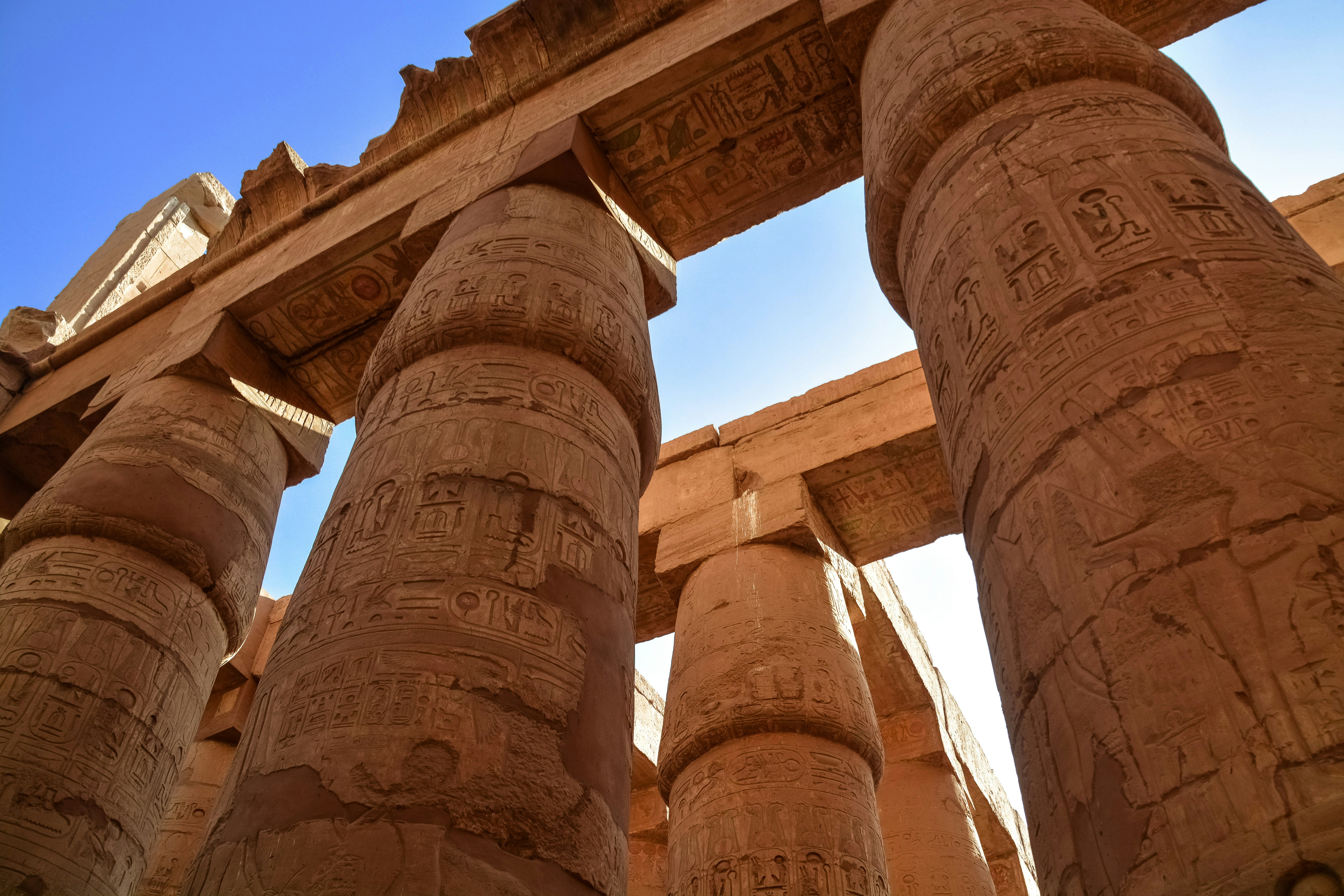 brown concrete pillars under blue sky during daytime